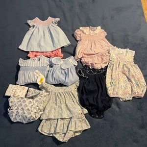 Brand new and like new 3-9month bubbles and sets. $50 total